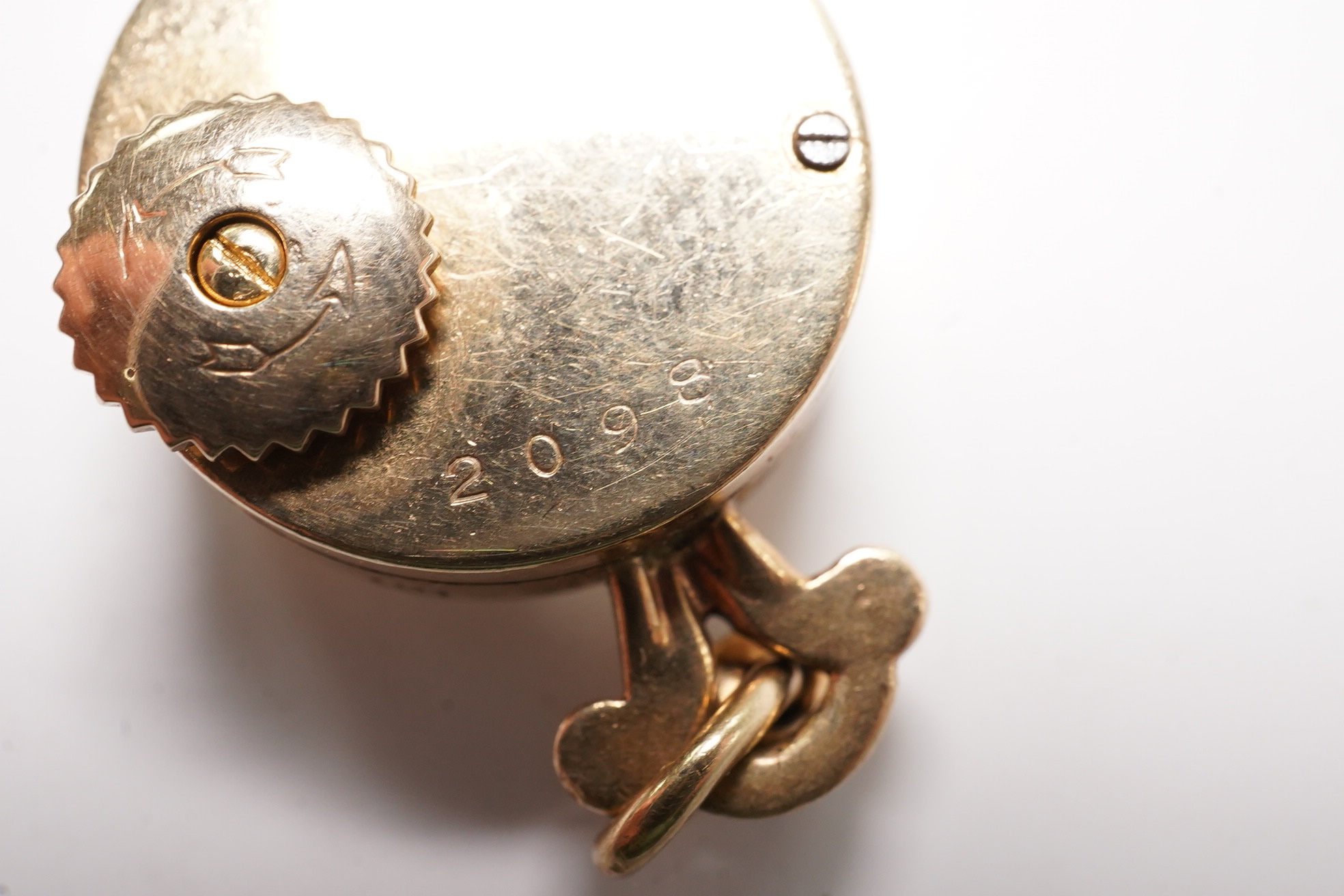 A lady's 9ct Jaeger LeCoultre manual back wind pendant watch, case diameter 15mm, gross weight 7.1 grams. Condition - fair